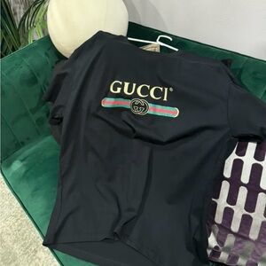 Gucci Black Tee with Iconic Logo and Stripe